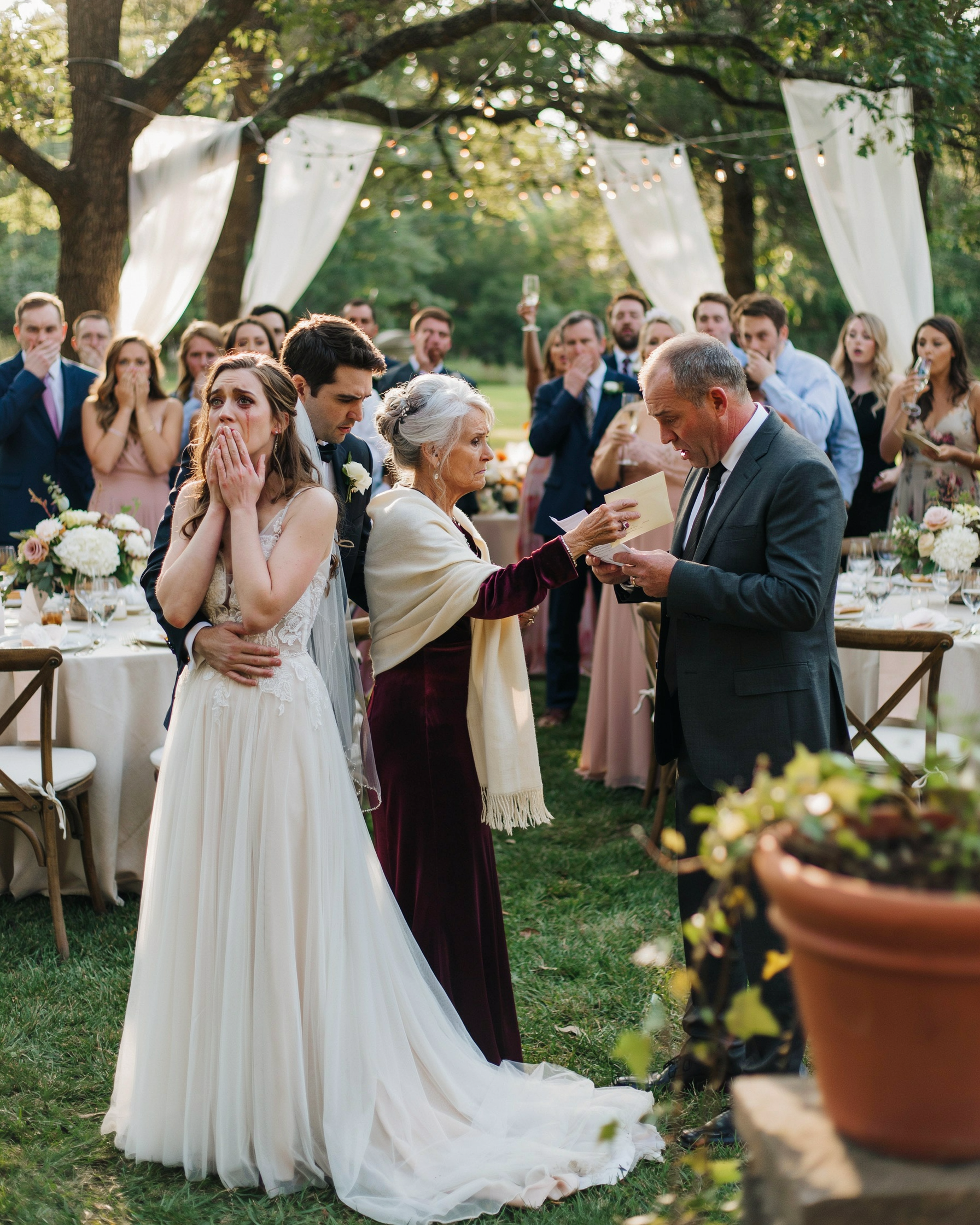 At My Own Wedding, My Stepfather Stood Up And Said “She’s Not My Daughter.” My Grandmother Walked To Him Slowly And Handed Him An Envelope. He Read The First Line And Sat Down — His Hands Shaking